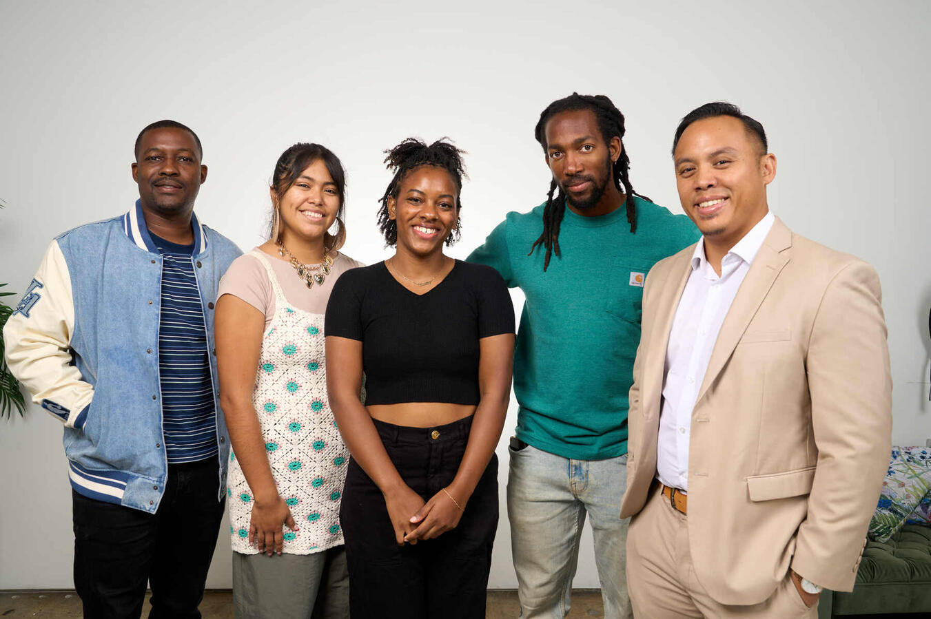 Bold Vision Team with a Guest Speaker Bold Vision staff and youth pose together with a guest speaker at the October Youth Summit.