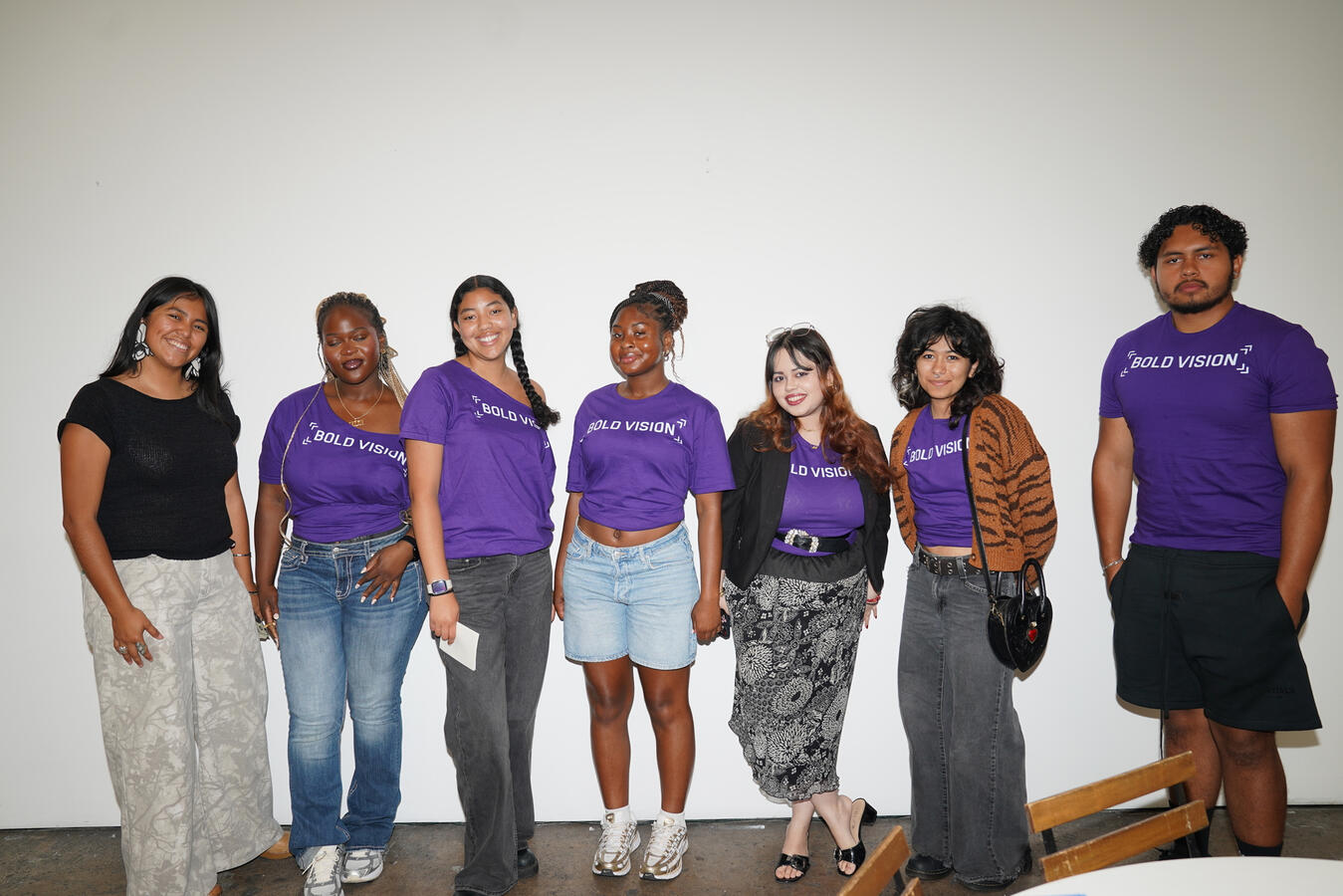 Bold Vision Youth Council in Purple Members of the Bold Vision Youth Council pose together in matching purple shirts.