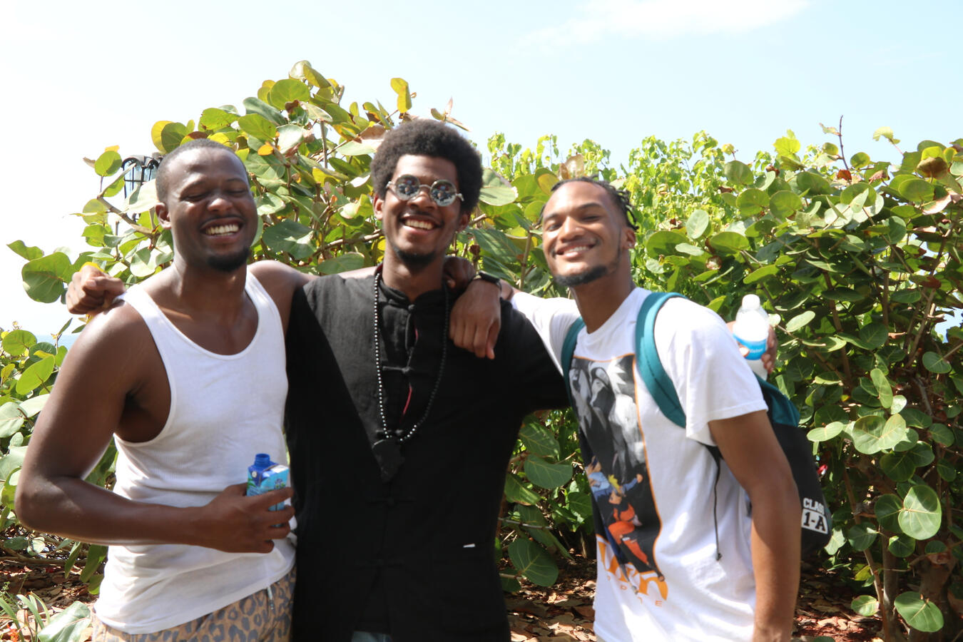 Fellows Outdoors in Puerto Rico Three delegation members smile together outdoors during the Puerto Rico fellowship.