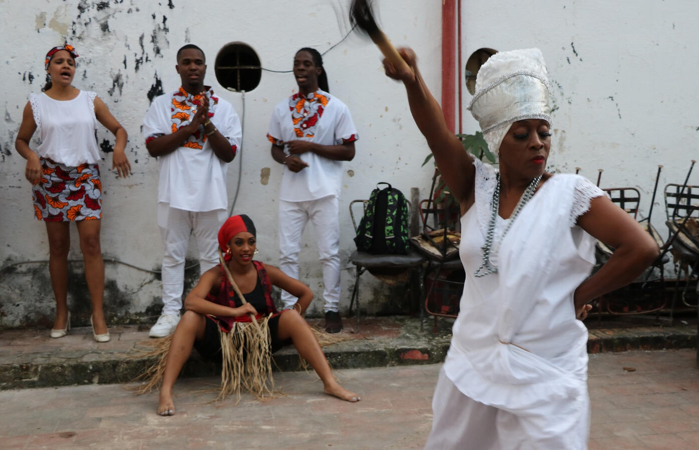 Afro-Cuban Ceremony in Havana Performers in white take part in an Afro-Cuban ceremonial dance in a Havana courtyard.