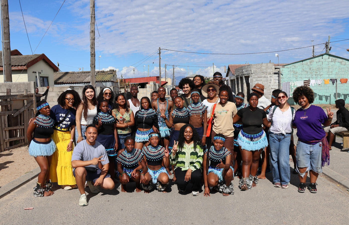 Full Delegation in a Cape Town Township The full delegation poses together in a township neighborhood in Cape Town.