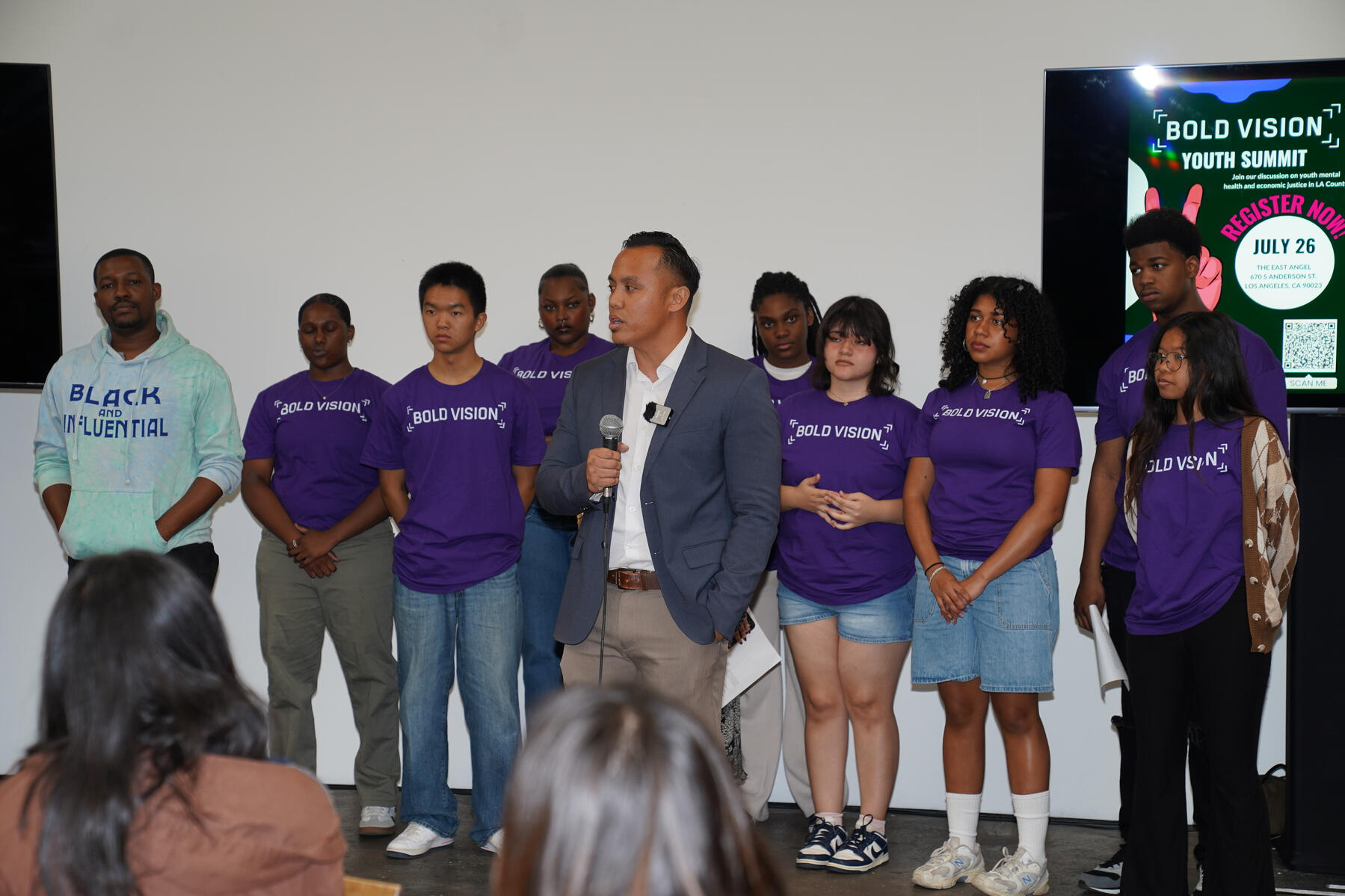 Gabriel Addressing the July 2025 Youth Summit A speaker addresses attendees on stage at the Bold Vision Youth Summit.